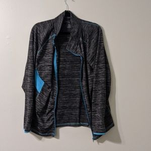 Active jacket with thumb pocket in sleeve